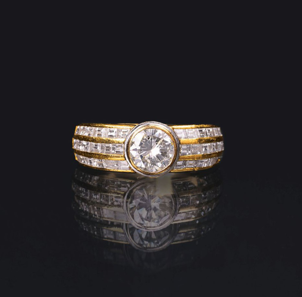 A Solitaire Diamond Ring with Diamonds A Solitaire Diamond Ring with Diamonds