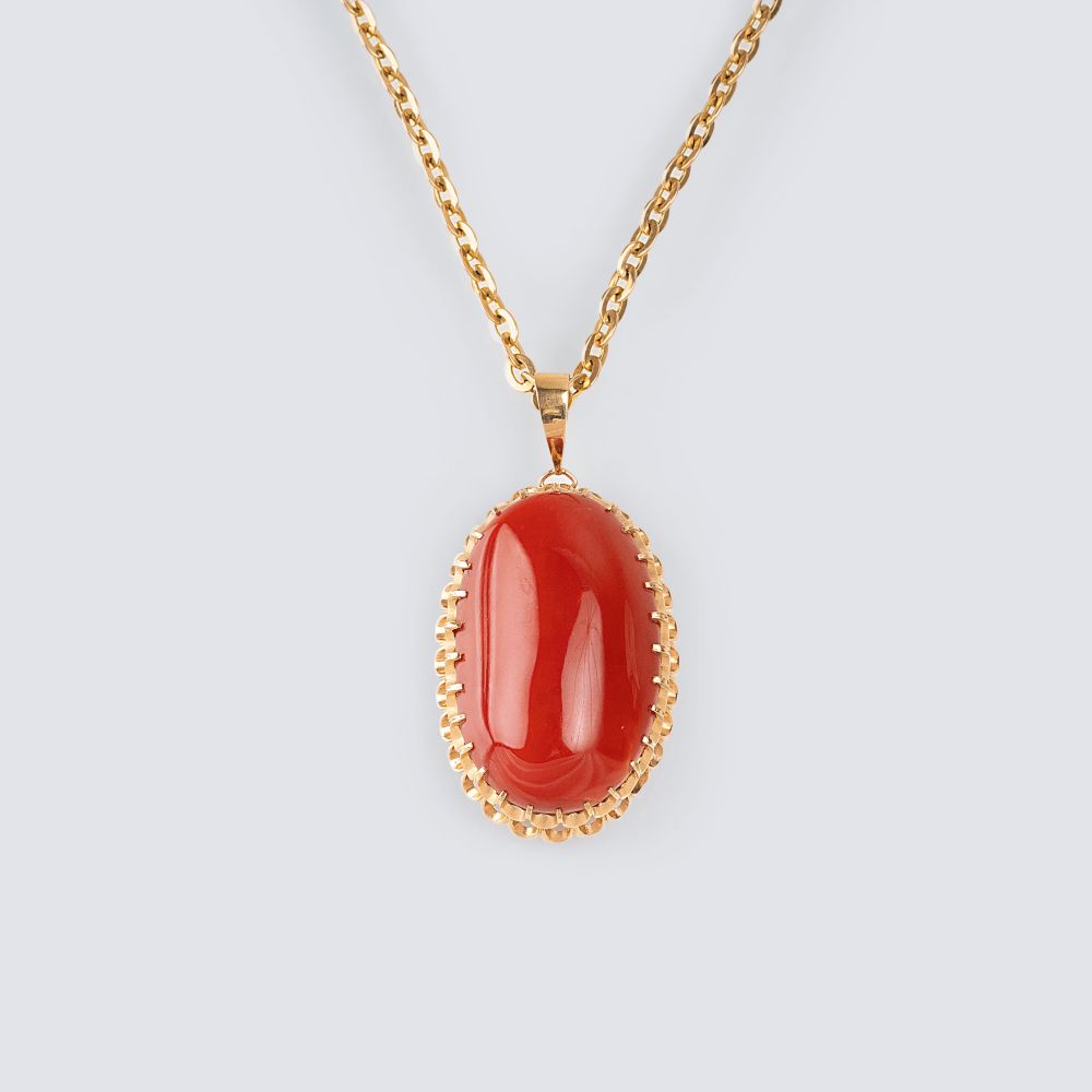 A large Coral Pendant on Necklace