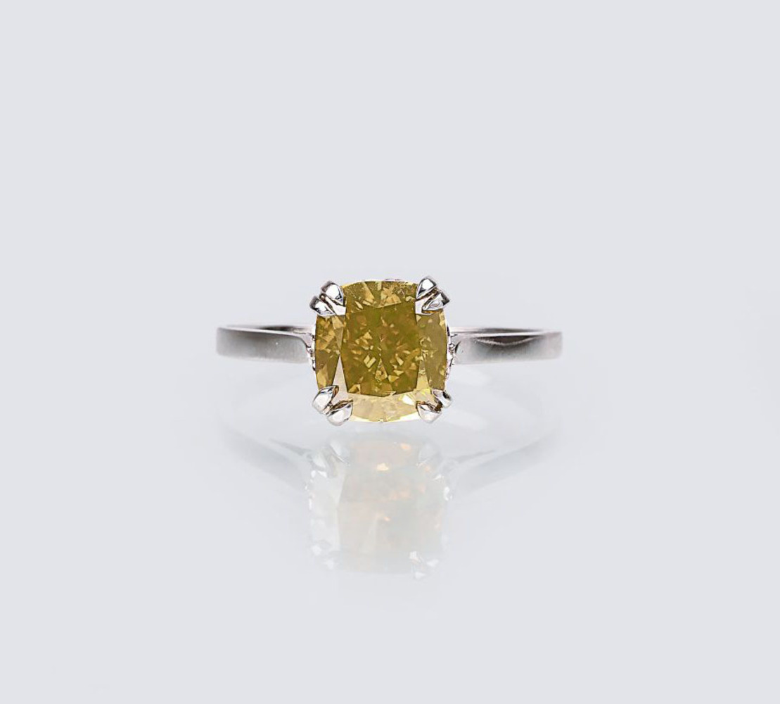 Galeries du Diamant, Paris - A Solitaire Fancy Diamond Ring A Solitaire Fancy Diamond Ring