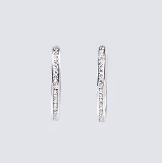 A Pair of Diamond Earrings