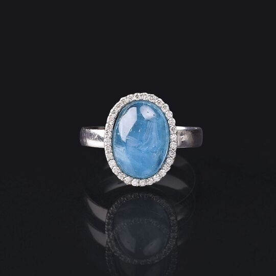 An Aquamarine Diamond Ring