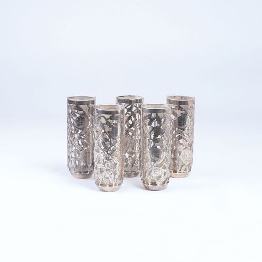 A Set of 5 Mugs with Floral Overlay