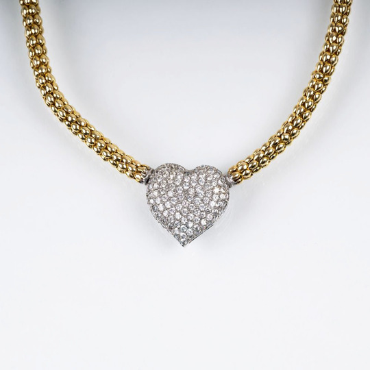 A Gold Necklace with Heart