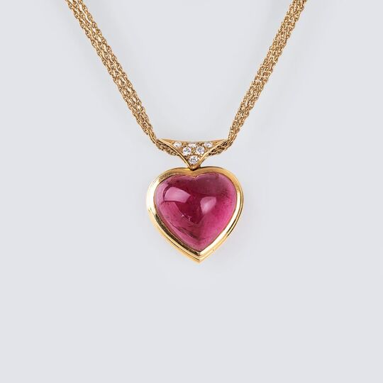 A heartshaped Rhodolite Pendant with Diamonds