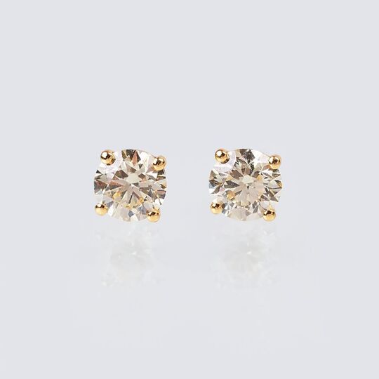 A Pair of Solitaire Diamond Earstuds with Fancy Diamonds