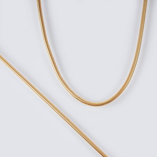 A Gold Necklace with matching Bracelet