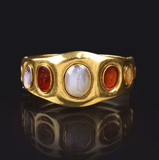 A Gold Bracelet with Antique Roman Intaglios