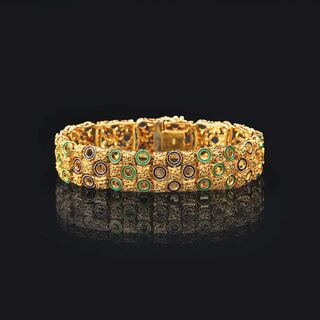 A Gold Bracelet with Enamel Ornaments