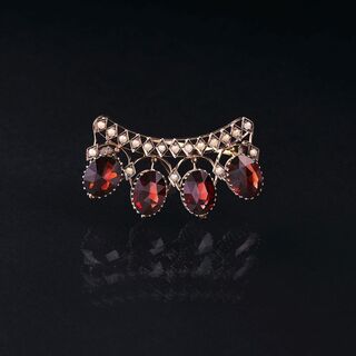 A Garnet Brooch with Seedpearls