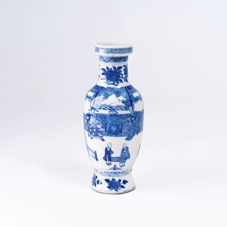 A Vase with Blue and White Decor