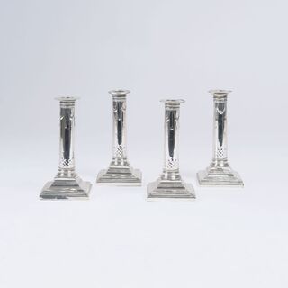 A Set of 4 George III Candle Holders