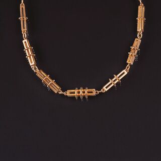 A long Gold Necklace