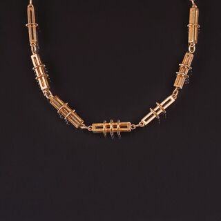 A long Gold Necklace