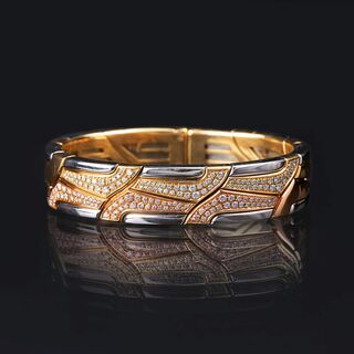 Bucherer - Tricoloure Armspange mit Brillanten 'Swan River Collection' Tricoloure Armspange mit Brillanten 'Swan River Collection'