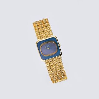 A Ladie's Wristwatch 'Golden Ellipse Grey Dial' with Gold Bracelet