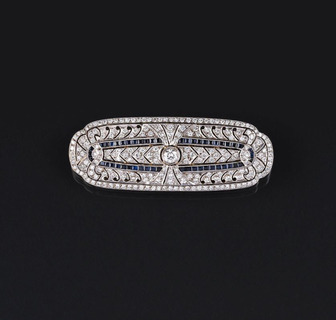 A Diamond Sapphire Brooch in the style of Art-déco