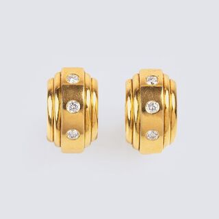 A Pair of Diamond Earrings