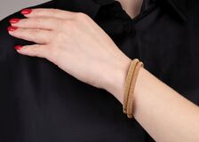 A Pair of bicolour Gold Bangle Bracelets - image 2