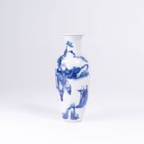 A  Vase with Blue and White Decor