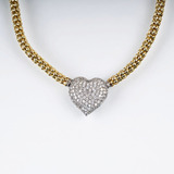 A Gold Necklace with Heart