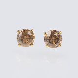 A Pair of Solitaire Diamond Earstuds with Fancy Diamonds
