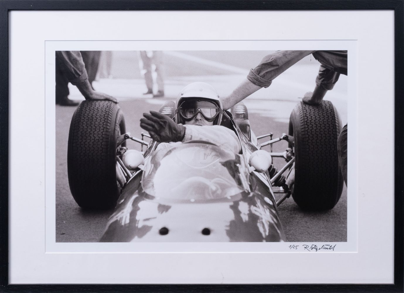 Bandini's Ferrari being pushed out of the pits - image 2