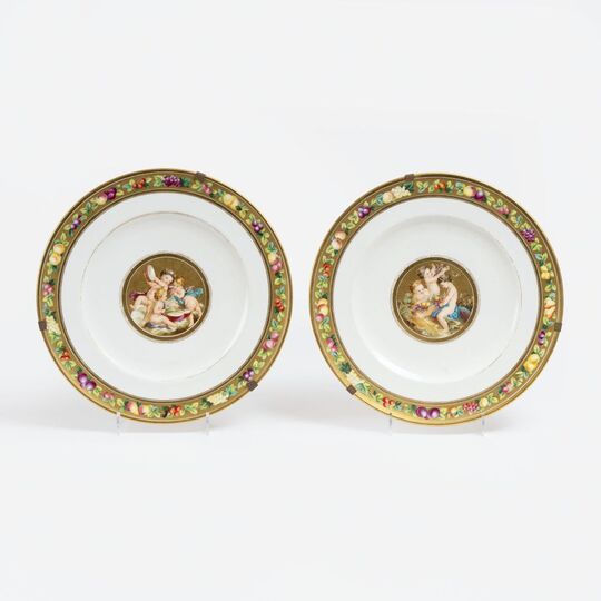 A Pair of Empire Plates with Putti