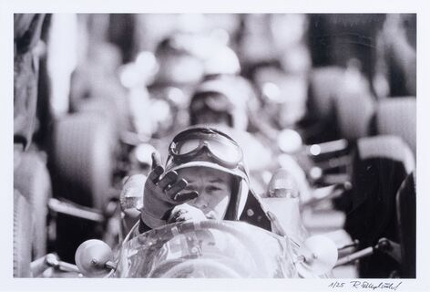 John Surtees prepares to race