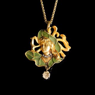 An Art Nouveau Plique-à-jour Diamond Pendant 'Lady with Hat'