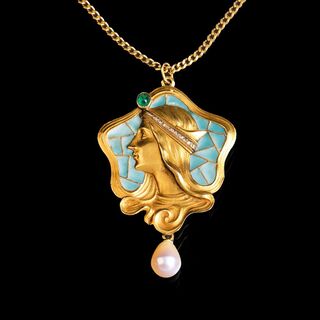 An Art Nouveau Plique-à-jour Pendant 'Lady with Diadem'