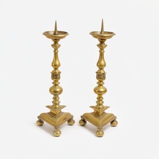 A Pair of Large Flemish Brass Candlesticks