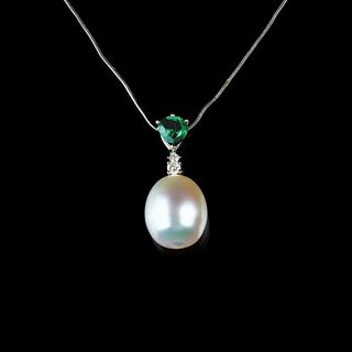 A Southseapearl Emerald Pendant on Necklace