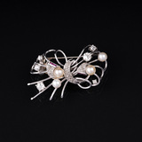 A Diamond Pearl Brooch