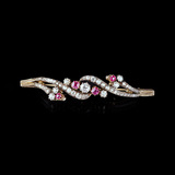 An Art Nouveau Brooch with Old Cut Diamonds and Rubies