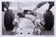 Bandini's Ferrari being pushed out of the pits - image 1