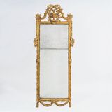 A Large Louis XVI Mirror with Vase-Culmination - image 1