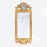 A Louis XVI Mirror with Figure Tondo - image 1
