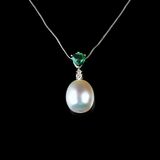 A Southseapearl Emerald Pendant on Necklace - image 1