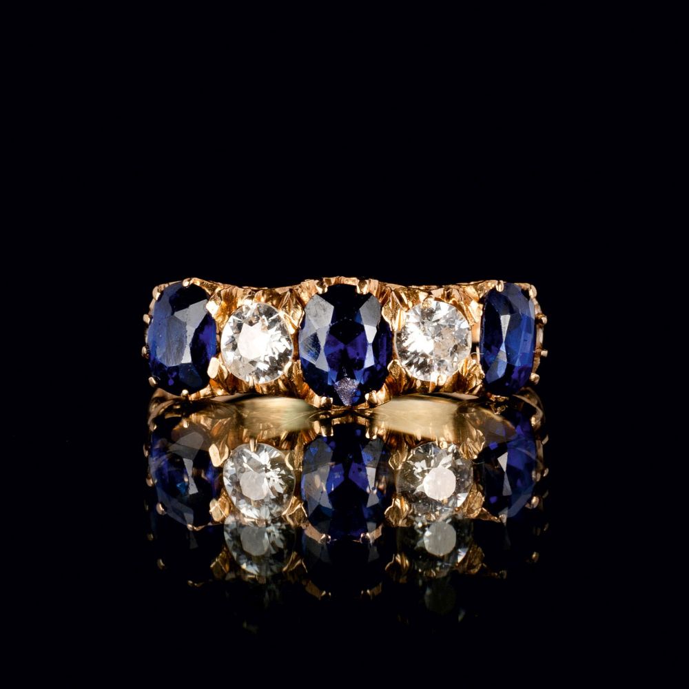 A Natural Sapphire Ring with Old Cut Diamonds A Natural Sapphire Ring with Old Cut Diamonds