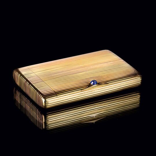 A Gold Etui with Sapphire Cabochon