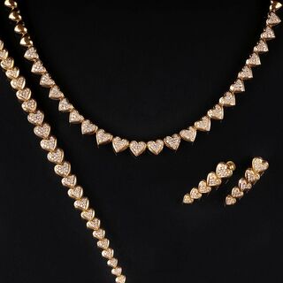 A Diamond Demi Parure with Hearts: Bracelet, Necklace and Earrings