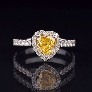 A heartshaped Fancy Intense Diamond Ring