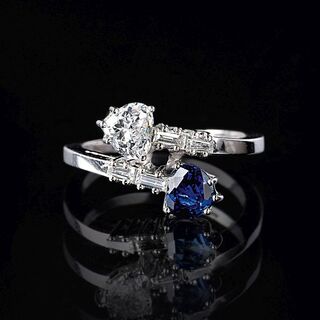 A Toi-et-Moi Ring with Hearts of Sapphire and Diamond