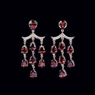 A Pair of colourfine Rubellith Earpendants with Diamonds