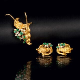 - An Emerald Jewellery Set: A Pair of Earclips and Pendant on Necklace An Emerald Jewellery Set: A Pair of Earclips and Pendant on Necklace