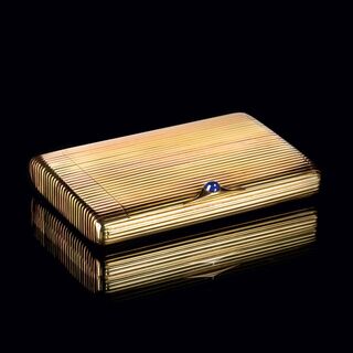 A Gold Etui with Sapphire Cabochon