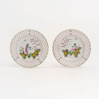 A Pair of Faience Plates with Chinoiseries