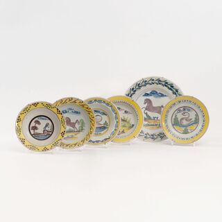 A Set of 5 Faience Plates and 1 Faience Dish
