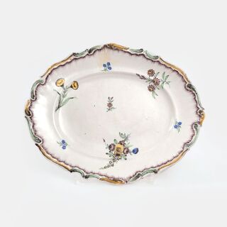 An Oval Faience Dish with Flower Painting