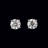 A Pair of rare-white Solitaire Diamond Earstuds